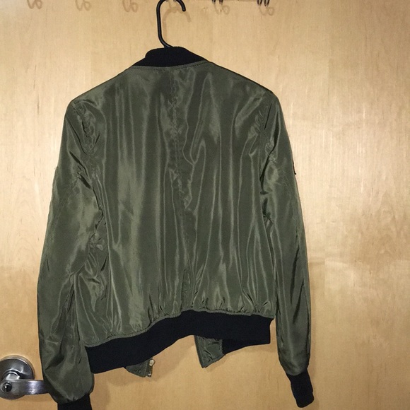 green bomber jacket. - Picture 2 of 2